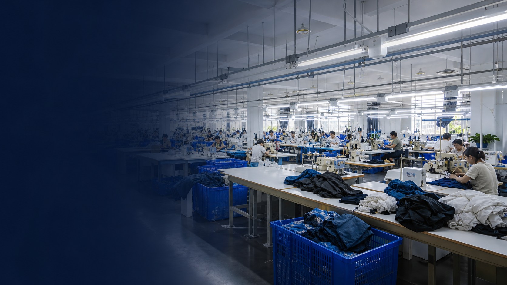 Wide editorial view of an active garment manufacturing floor